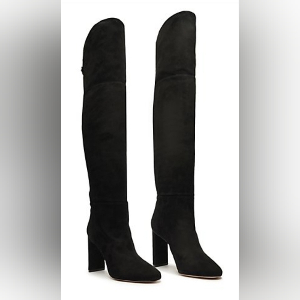 Over the knee boots.  See pic for heel damage